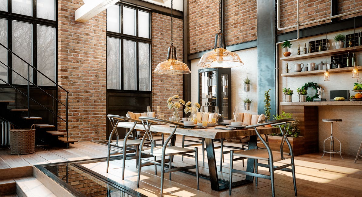 Loft mit Ziegeloptik, Holztisch und hohen Fenstern
